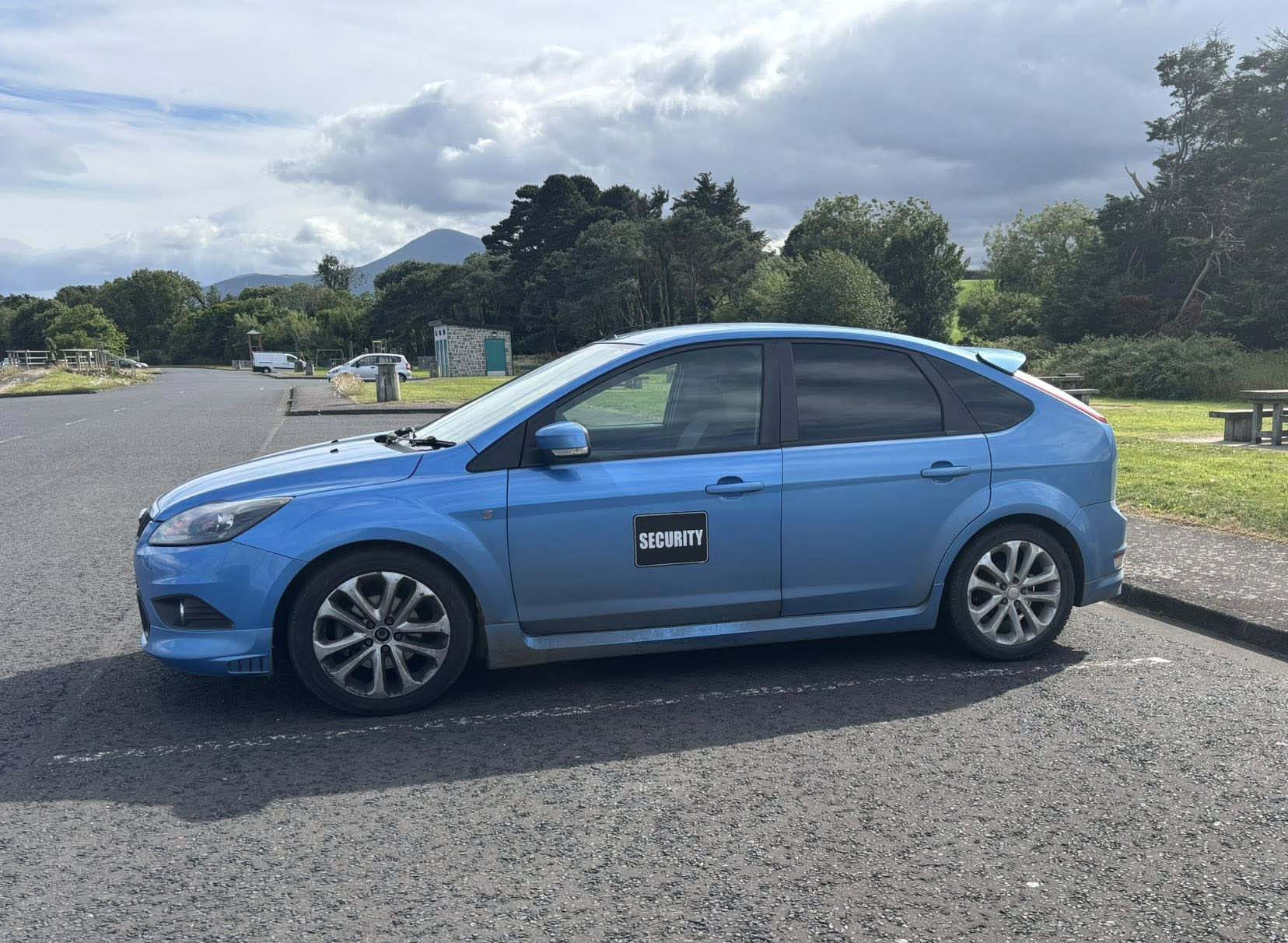 Blue Ford Focus parked at Dundrum